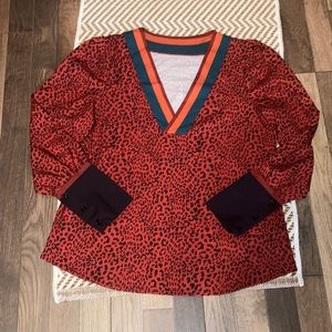 Bright red/orange with cheetah print fun long sleeve blouse!